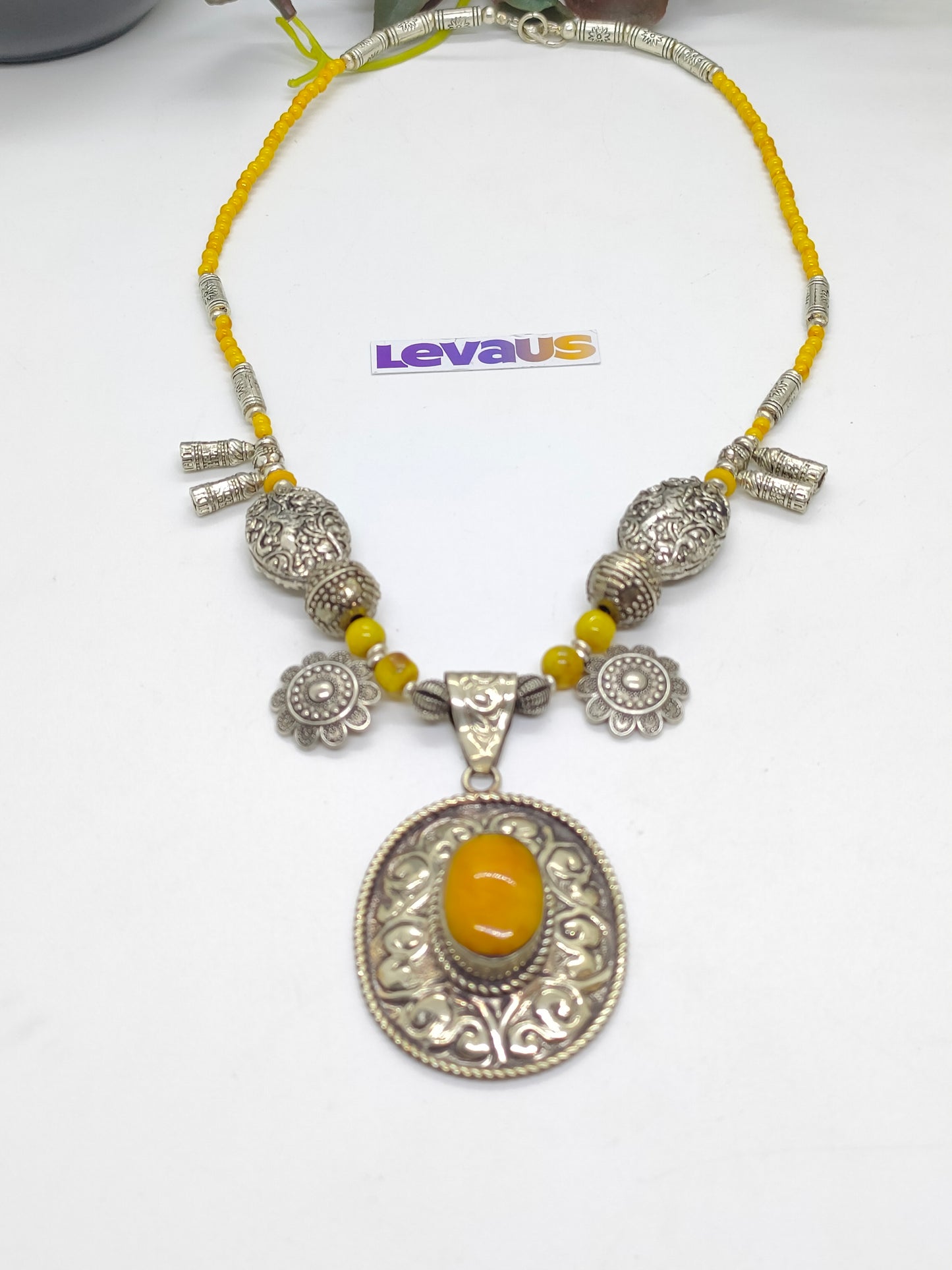 Amber stone with metal pandent necklace