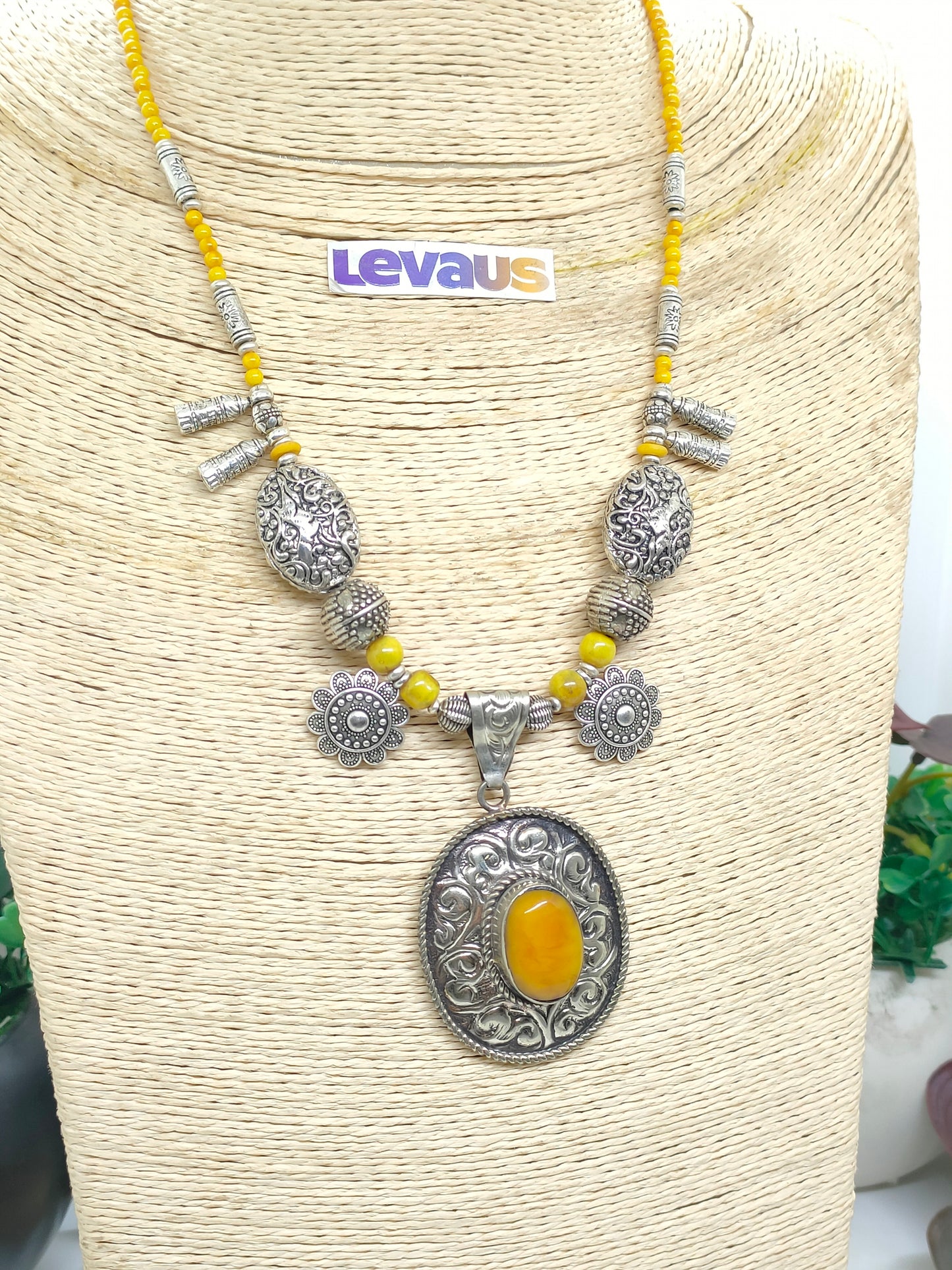 Amber stone with metal pandent necklace