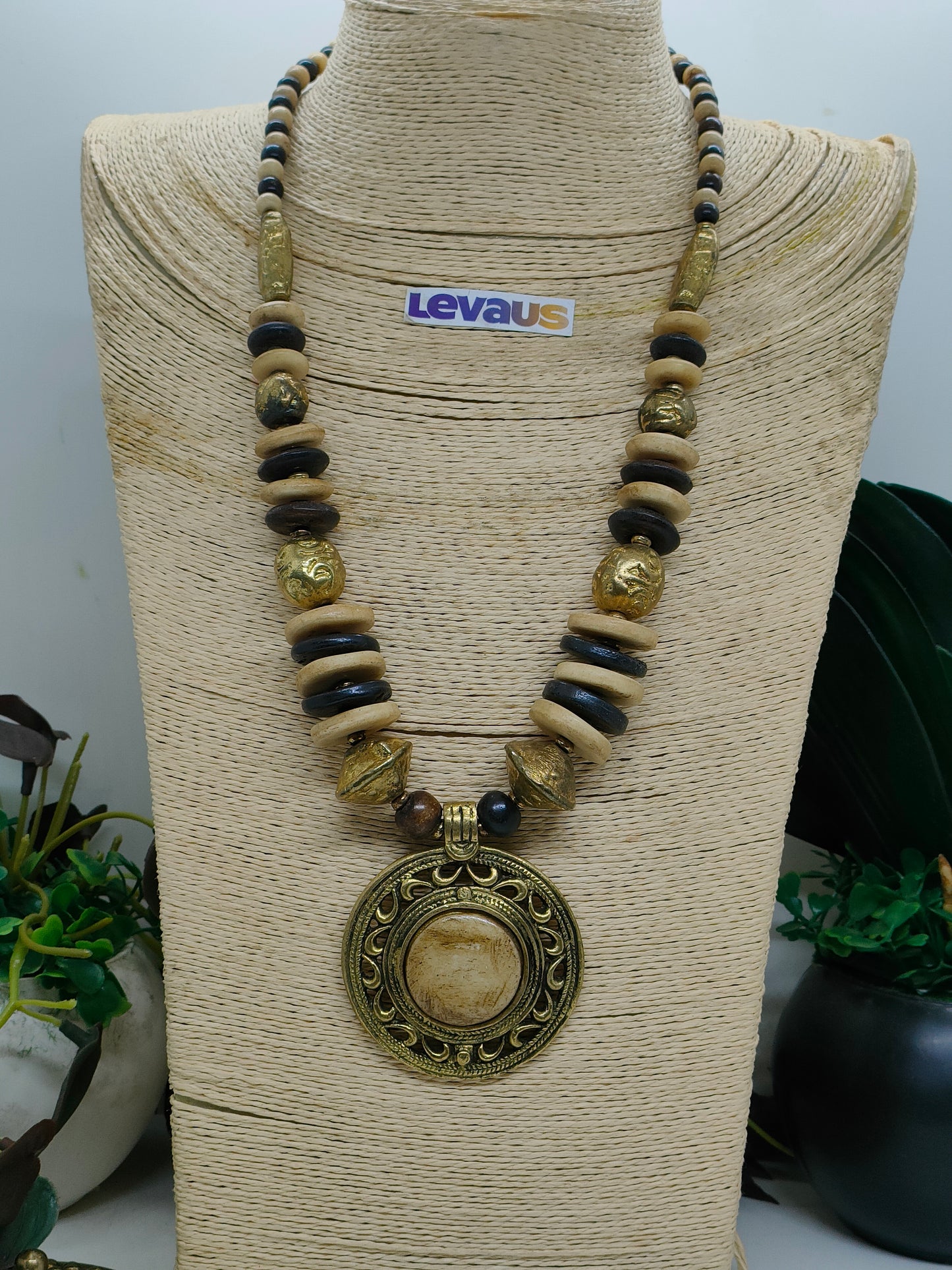 Antique bones and brass pendant necklace